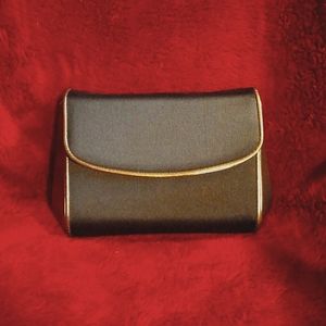 Salvatore Ferragamo black silk and metallic leather evening clutch.